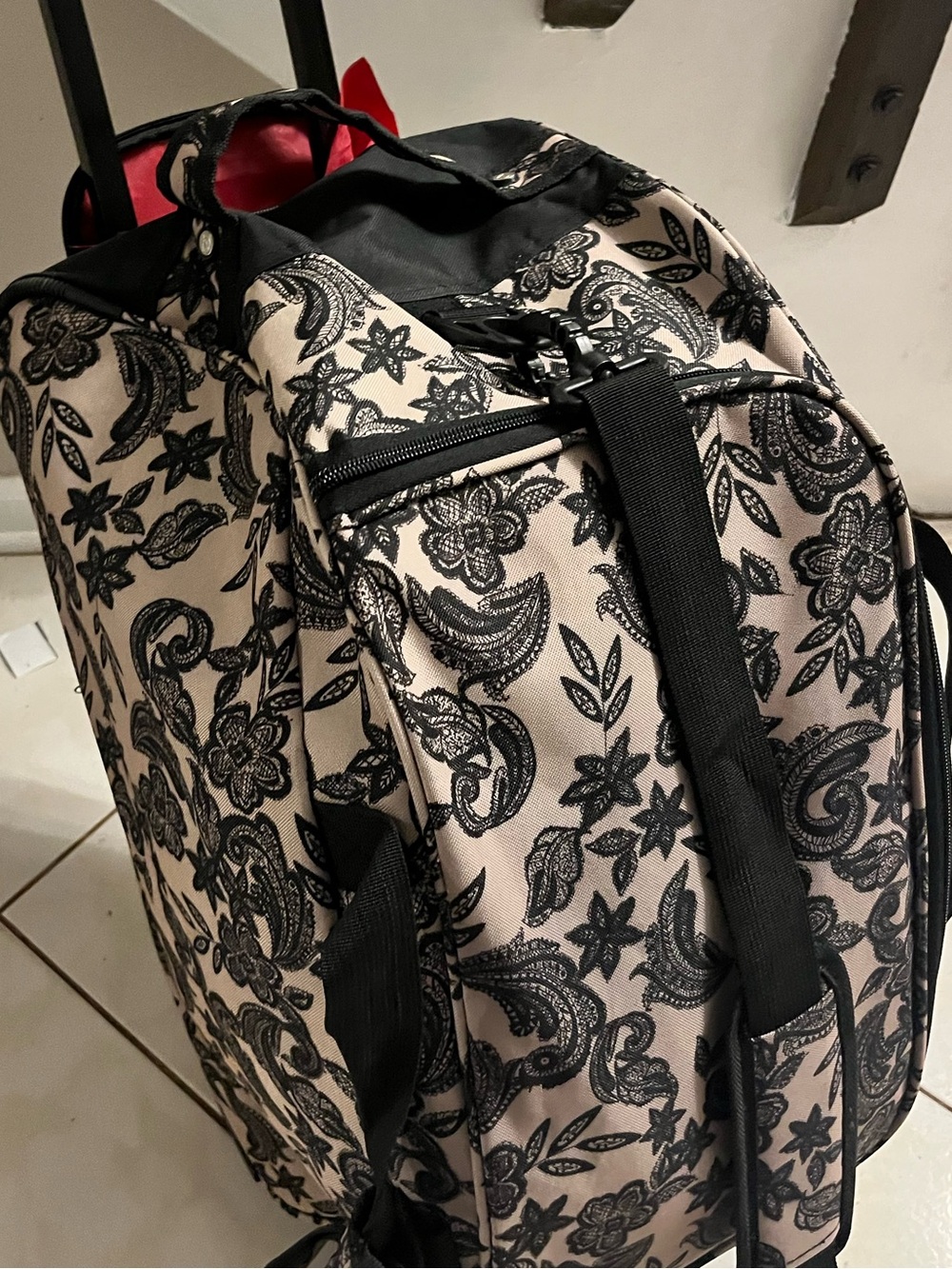 Black and Cream Paisley/Floral Rolling Duffel Bag by CalPak